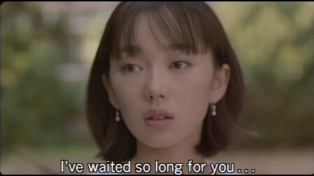 A close up of Kiyomi saying the line "I’ve waited so long for you…"