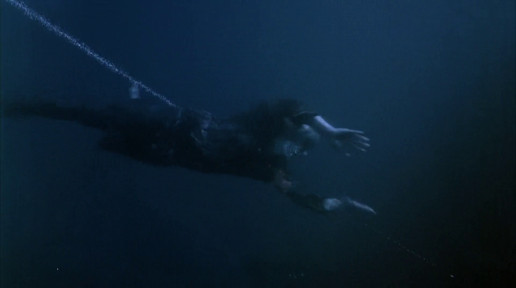 A screenshot of the film, showing a "zombie" swimming through deep water.
