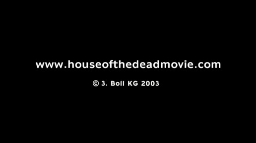 A screenshot from closing seconds of the film, after the credit crawl. There is white text on a black background which reads "www.houseofthedeadmovie.com © 3. Boll KG 2003".