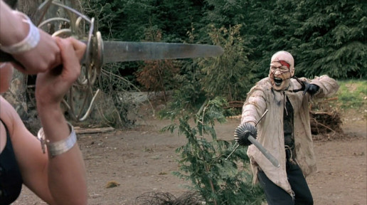 Two of the remaining characters from the film face off in a sword fight.