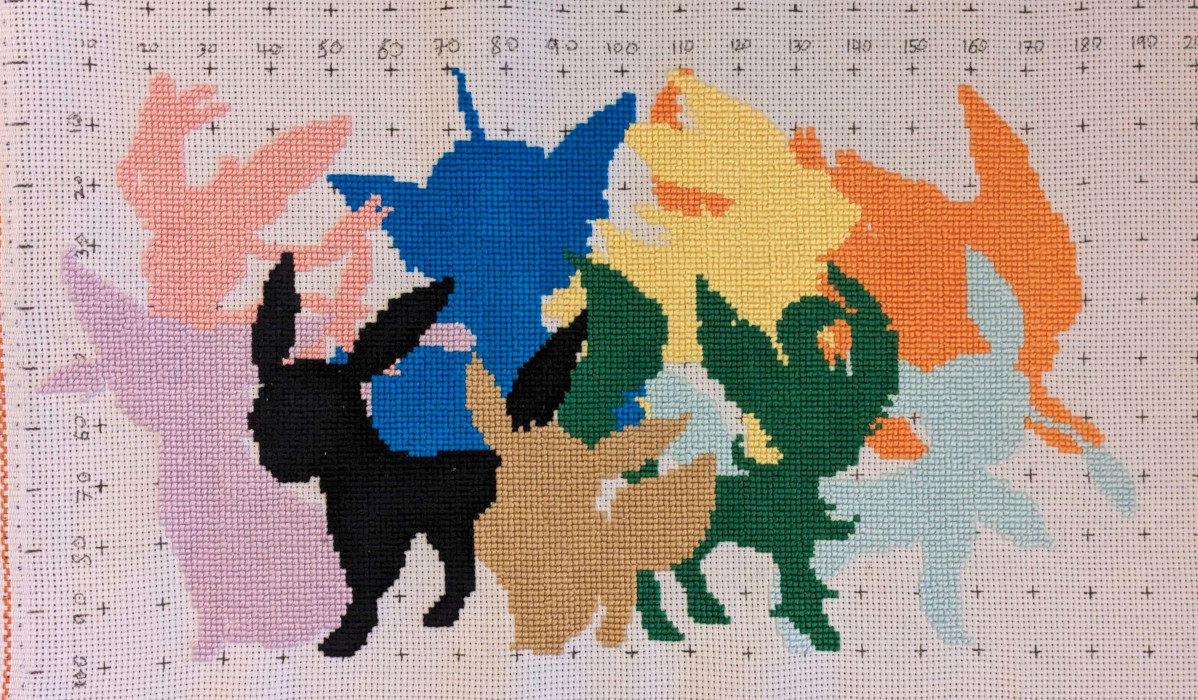 One of Squidge's many Pokemon cross stitches. This one shows all of the evolutions of Eve